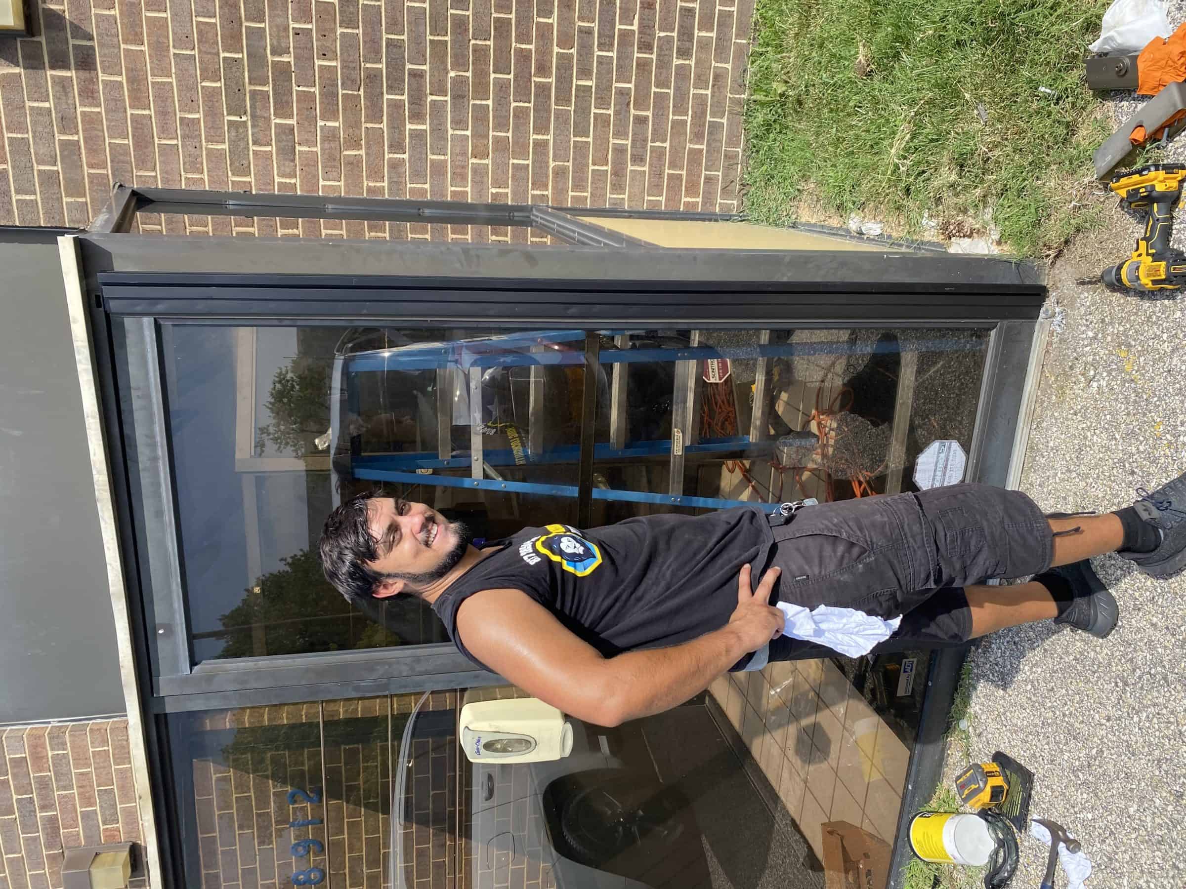 Locksmith Near Me A Hardworking Locksmith Just Finished His Job In Repairing Door. Search Locksmith Near Me For A Reliable Services