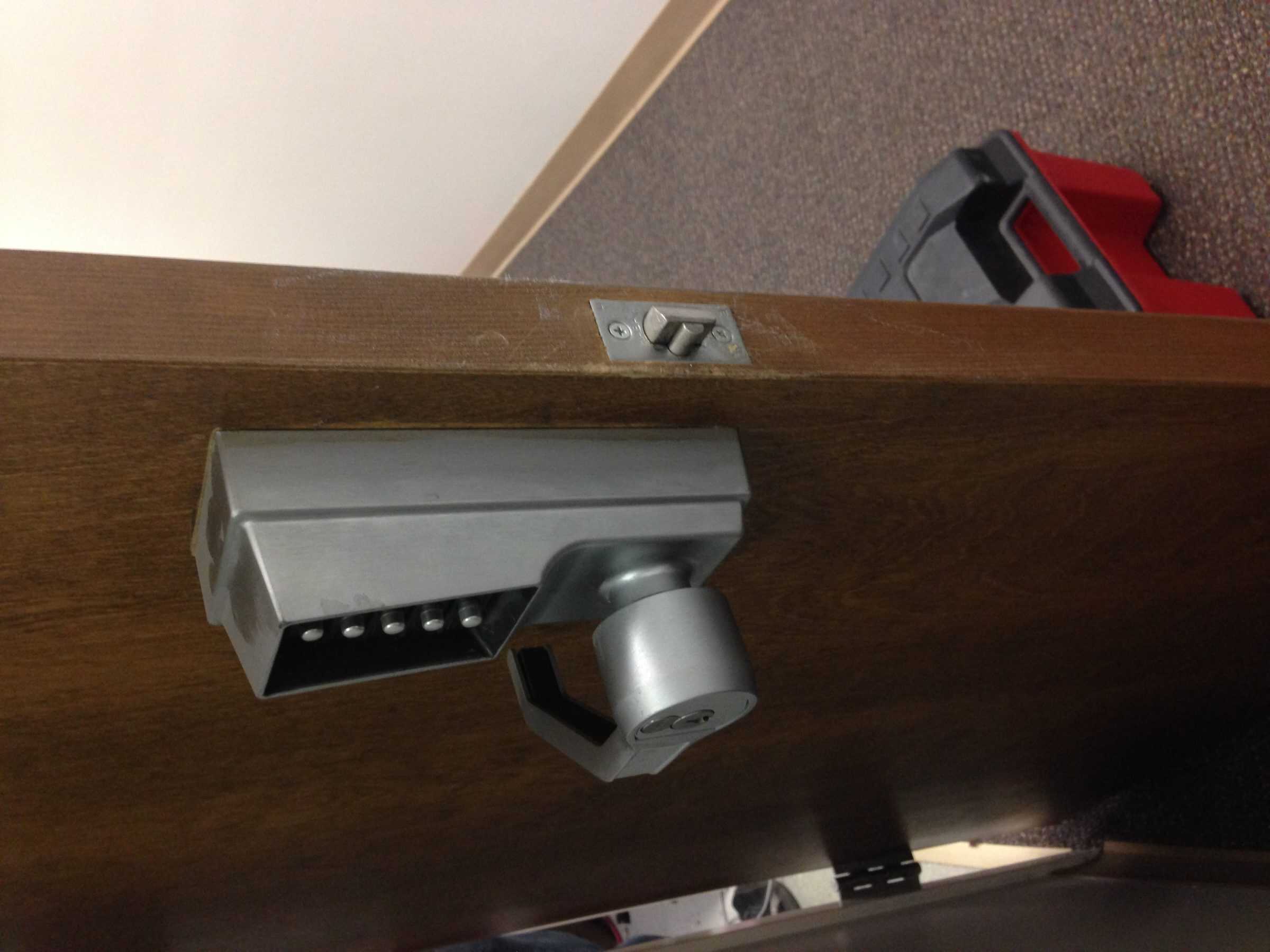 A Close-Up Of A High-Quality Door Lock With Intricate Details And A Shiny Finish.
