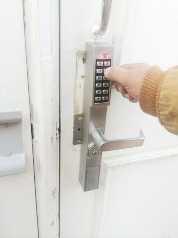 White Door With Keypad Installed, Suitable For Access Control Installer.
