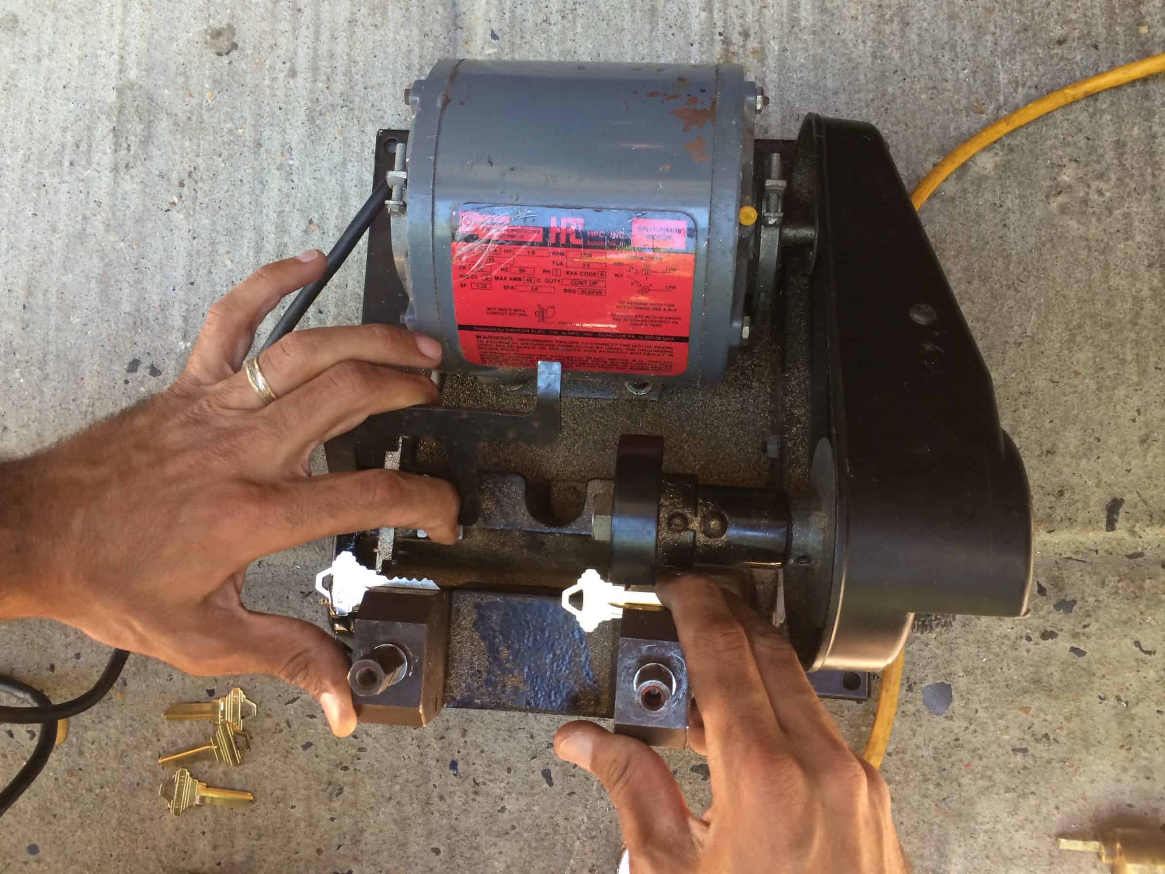 A Commercial Locksmith Performing Rekeying Services, Representing Commercial Locksmith Services.