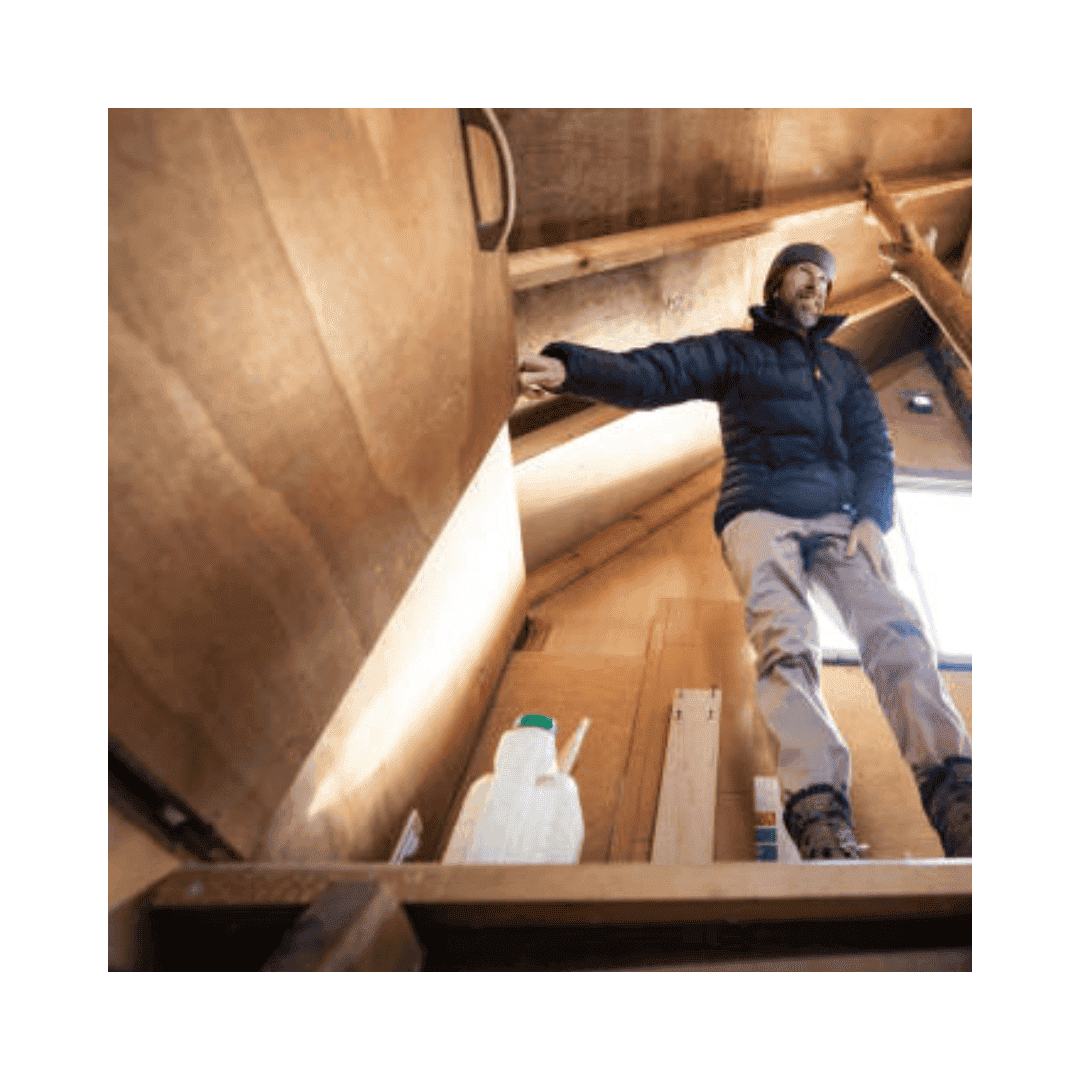 Attic Door Repair In Annapolis Md Man In Attic Holding The Door That Need To Be Repair In Annapolis