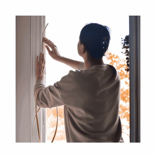 A Girl In White Sweat Shirt Check Her Front Door Door Insulation In Germantown For Repair By King Locksmith