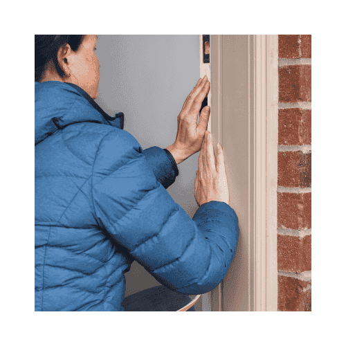A Girl In Blue Jacket Check Her Front Door Door Insulation In Germantown For Repair By King Locksmith