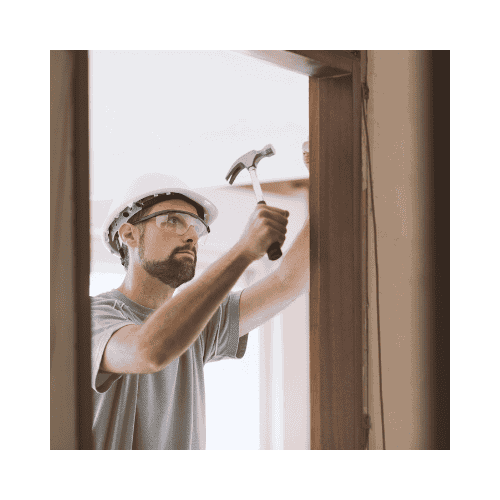 Man In Safety Gear With Hammer Repaired Door Jamb In Germantown