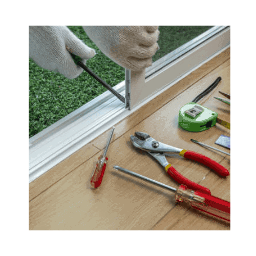 Locksmith With White Gloves And Tools Repairing The Door Roller In A Sliding Door At Germantown Md