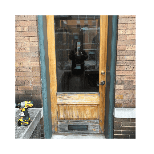 Yellow With Green Frame Single Door Was Repaired In Germantown Md By King Locksmith And Doors Inc.