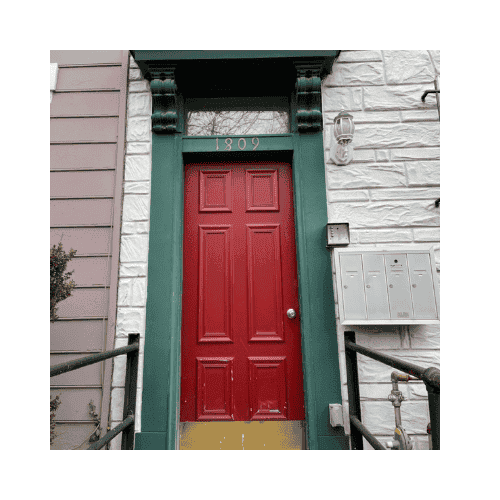 Red With Green Frame Single Door Was Repaired In Germantown Maryland By King Locksmith And Doors Inc.