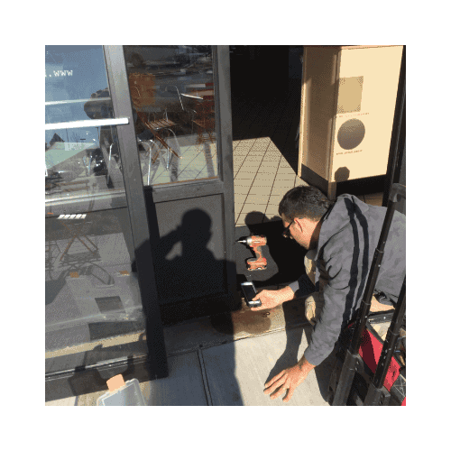 Black Sliding Door Checked By King Locksmith For Repair In Germantown Md