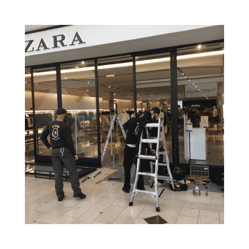 Commercial Locksmith Glen Burnie Md In Black Are Repairing The Storefront Door 