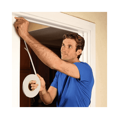 Man In A Blue Shirt Doing Weather Stripping In His Door At Ellicott City Maryland