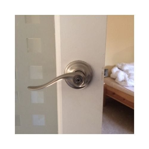 White Door With Golden Door Knob Was Successfully Repaired By King Locksmith In Burtonsville