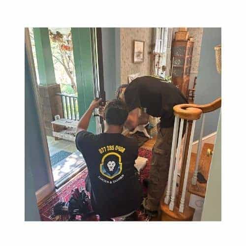 Two Locksmith In Black Uniform For Door Locks Repair In Burtonsville Maryland