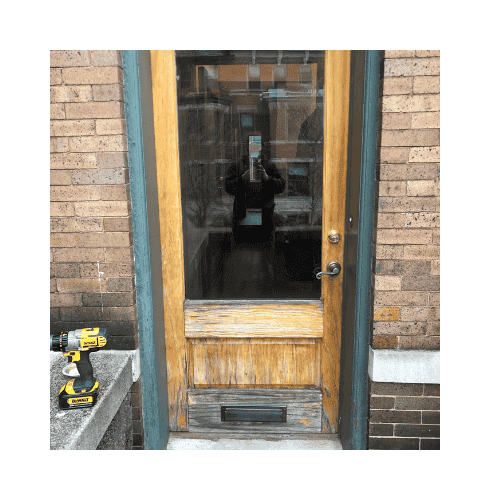 Yellow With Green Frame Single Door Was Repaired In Bethesda Md By King Locksmith And Doors Inc.