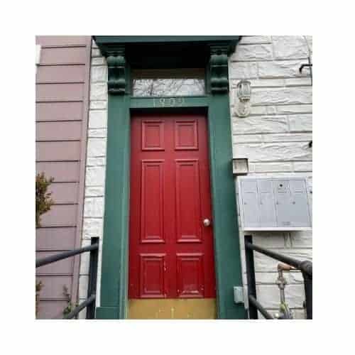 Red With Green Frame Single Door Was Repaired In Burtonsville Maryland By King Locksmith And Doors Inc.