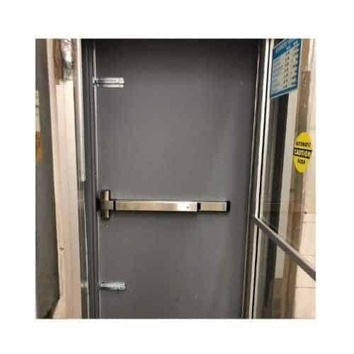 Grey Steel Door Repair With Panic Bar Repaired By King Locksmith In Burtonsville Maryland