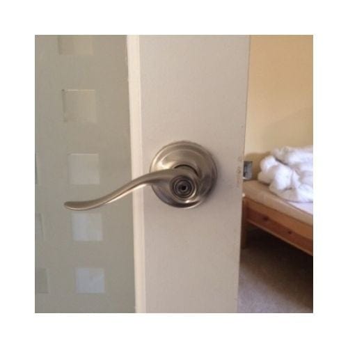 White Door With Golden Door Knob Was Successfully Repaired By King Locksmith In Beltsville