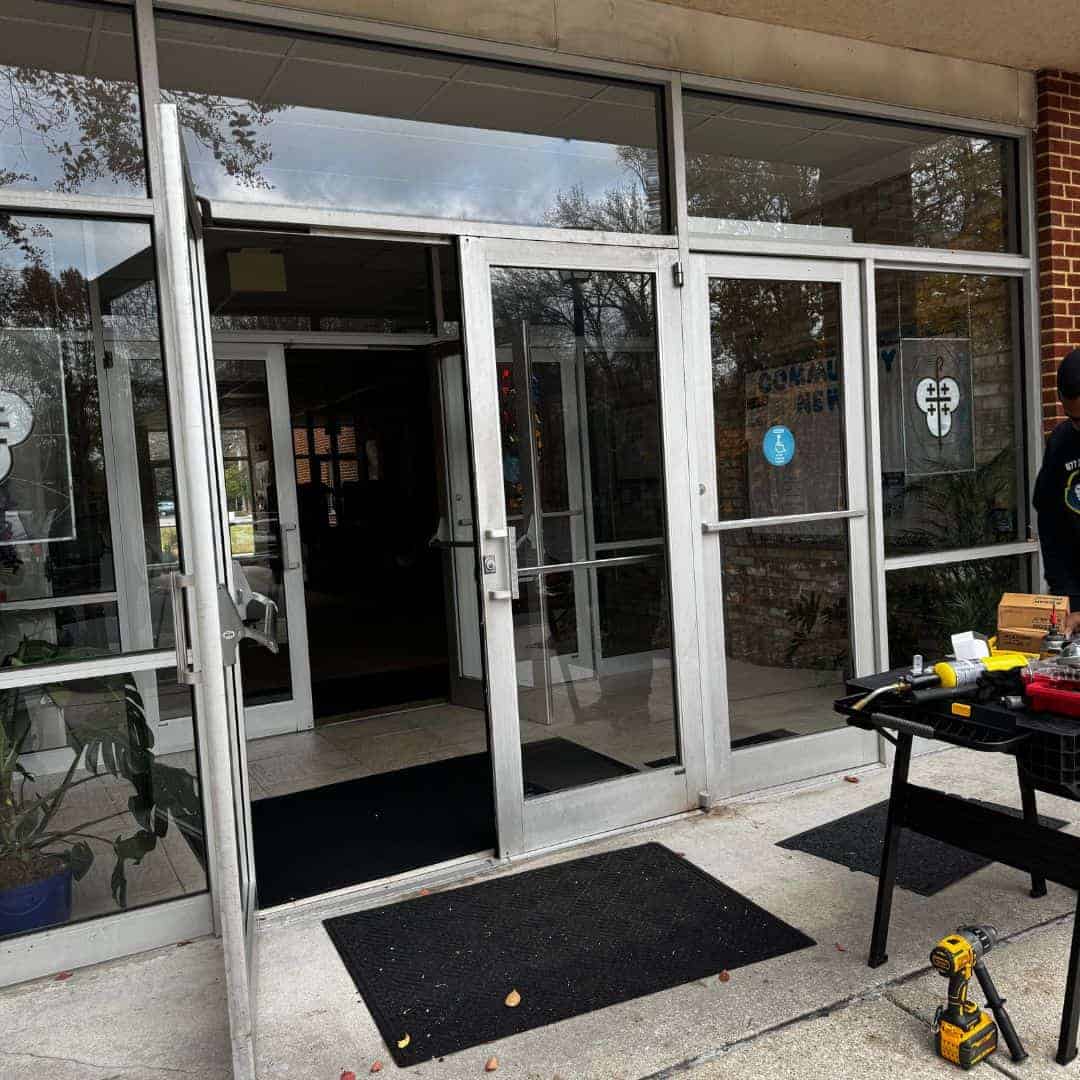 Commercial Georgetown Locksmith Commercial Locksmith Services In Georgetown Displayed With A Focus On Repairing Or Installing Locks On Glass Double Doors