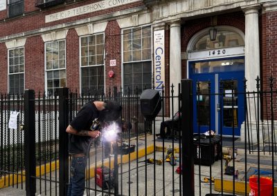 Our Commercial Locksmith 20001 Is Working On A Gate'S Telephone Company