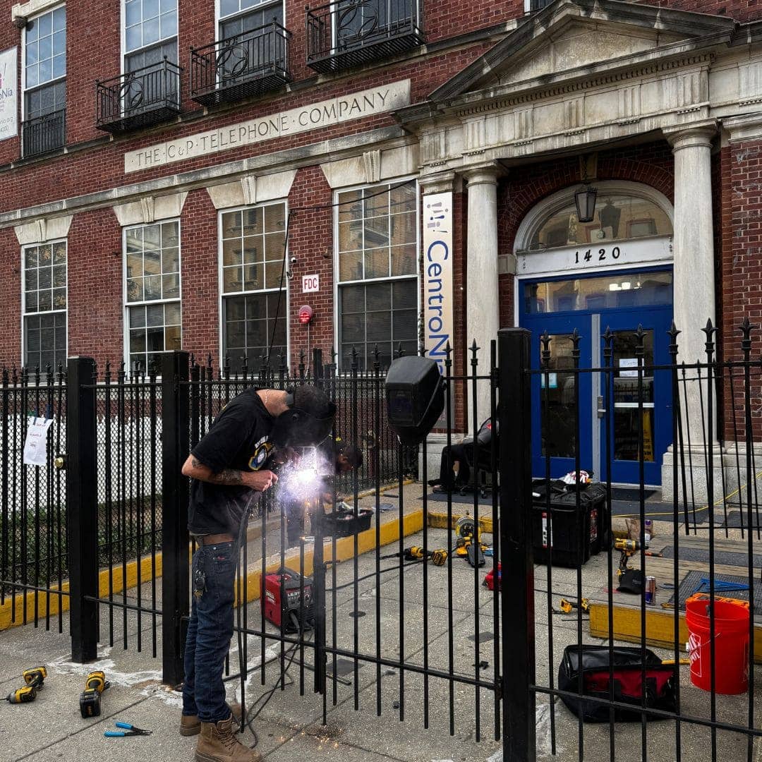Our Commercial Locksmith 20001 Is Working On A Gate'S Telephone Company