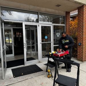 Commercial Locksmith Dc Union Station Setting Up And Repairing A Glass Entry Door For A Business Property.