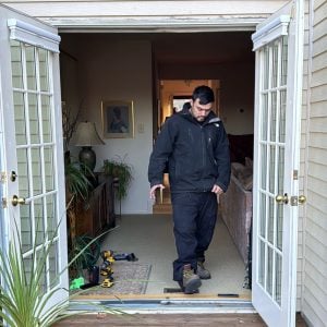 Our Locksmith 20004 Working On The Installation Of A Residential Door Lock In The 20004 Dc Area, Ensuring Enhanced Security For The Home.