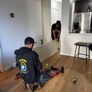 Residential Locksmith Dc Union Station Installing A Door Inside A Modern Apartment.