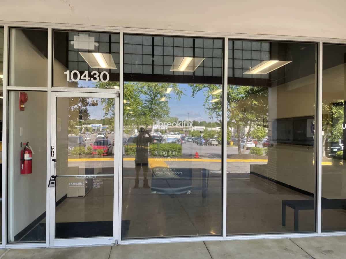 Commercial Storefront Glass Entry With Aluminum Framing And Access-Controlled Door Hardware Serviced By A Locksmith Rockville Md To Support Secure Office Workflow And Reliable Daily Entry Performance