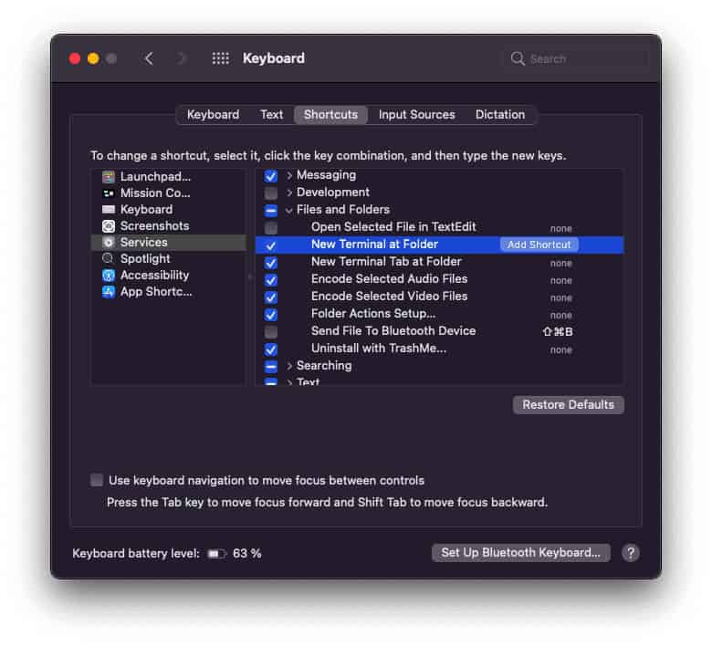 Enable the "New Terminal at Folder" service on your Mac (and add a keyboard shortcut)