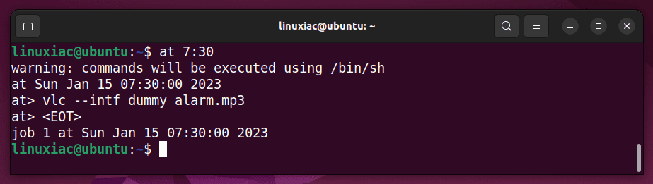 Scheduling a job using the at command.