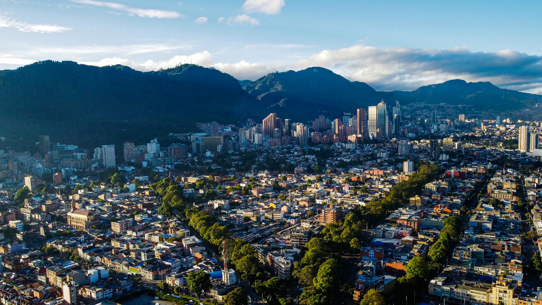 aerial view of bogota skyline with mountains