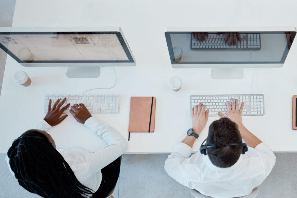 2 telemarketers in a call center