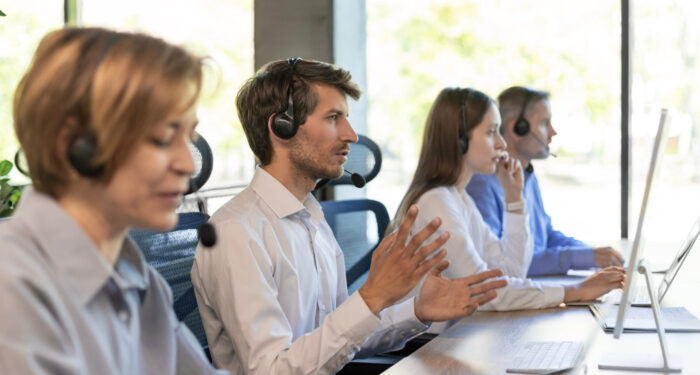 young businesspeople and colleagues in a call center office