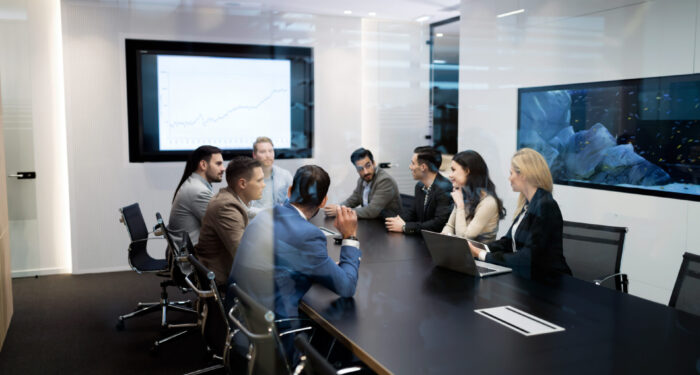 Picture of people having business meeting in conference room
