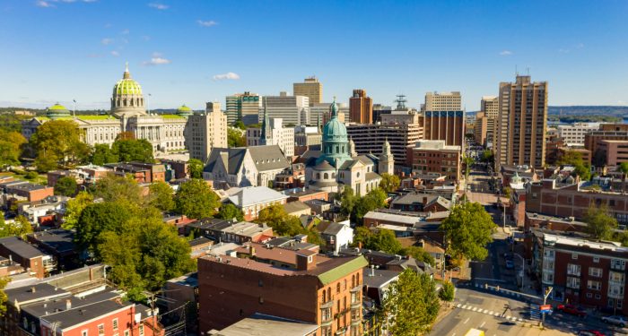 Aerial view of Harrisburg Pennsylvania skyline with state Capitol building, representing new telemarketing compliance law