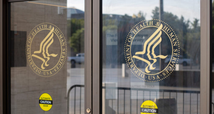 Washington, DC, USA - June 24, 2022: The symbol of the U.S. Department of Health and Human Services is seen at the entrance to its headquarters in the Hubert H. Humphrey Building in Washington, DC.