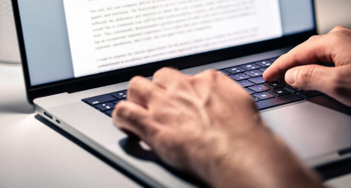 Writing text document, online content, book, letter or essay. Writer, journalist or freelance columnist with laptop. Resume, news article, report or college application. Freelancer, editor or employee