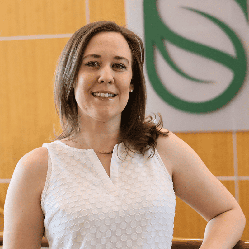 Headshot of a women in a white shirt | Dr. Linna Goelz