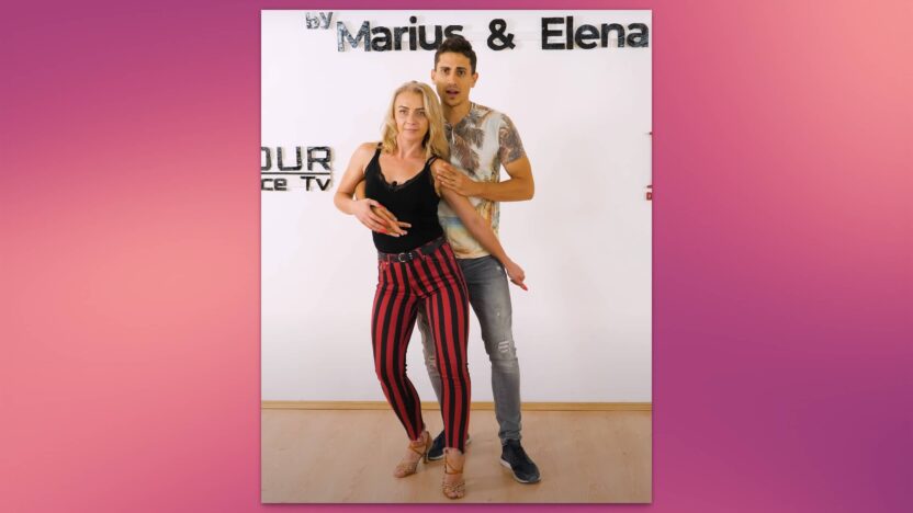 Pareja bailando bachata, mostrando el movimiento de caderas de lado a lado.
