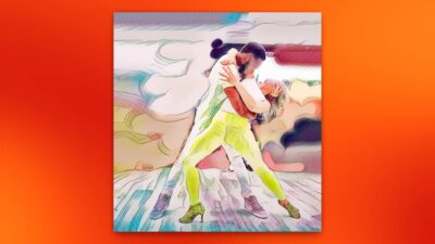 Pareja bailando bachata, mostrando la figura de apoyo de caída.