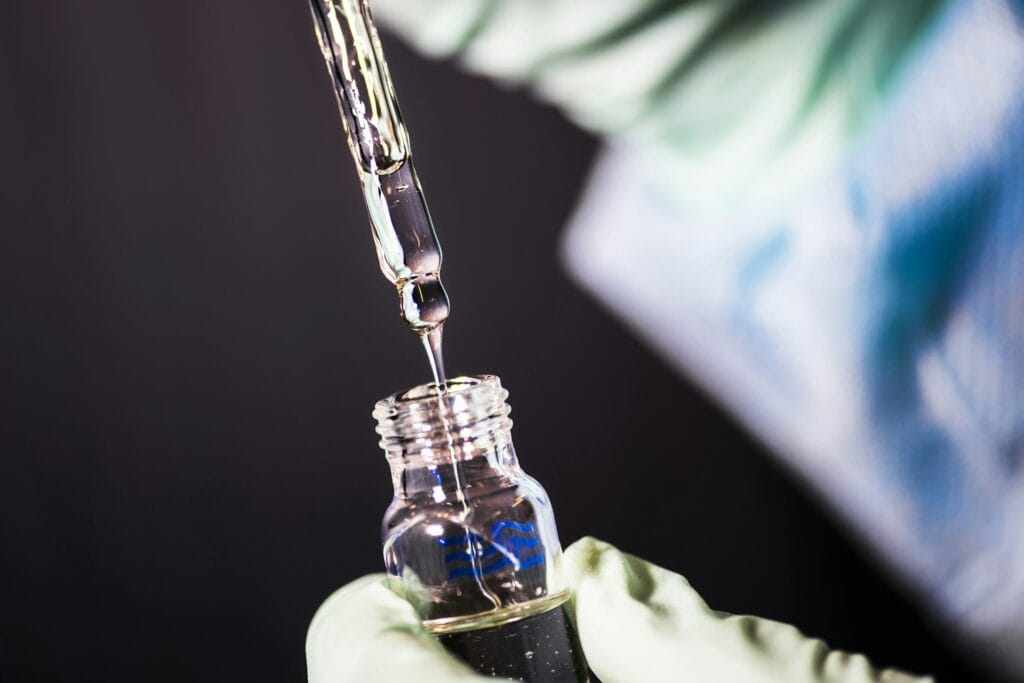 clear-glass-bottle-with-syringe