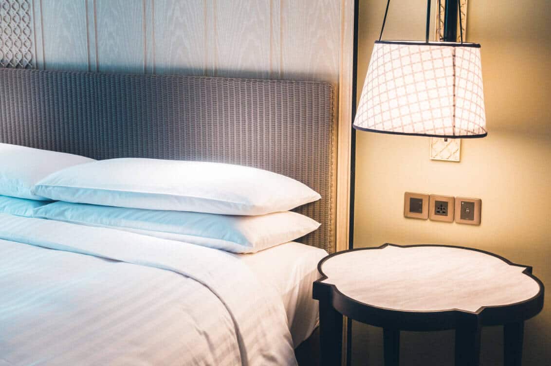 One way to make your hotel more sustainable is to switch out normal light bulbs with more energy efficient options