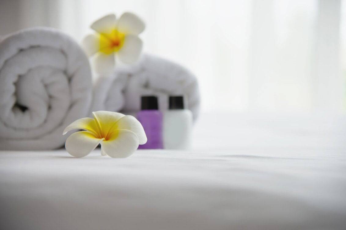 Sustainable hotel practices start small, like presenting guests with recyclable shampoo and conditioner bottles