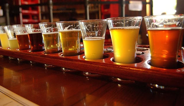 A flight of Belgian sour beer samples.