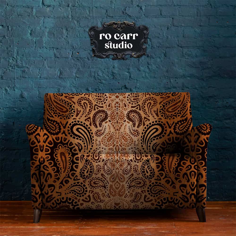 Leopard paisley pattern shown as upholstery on a love seat.