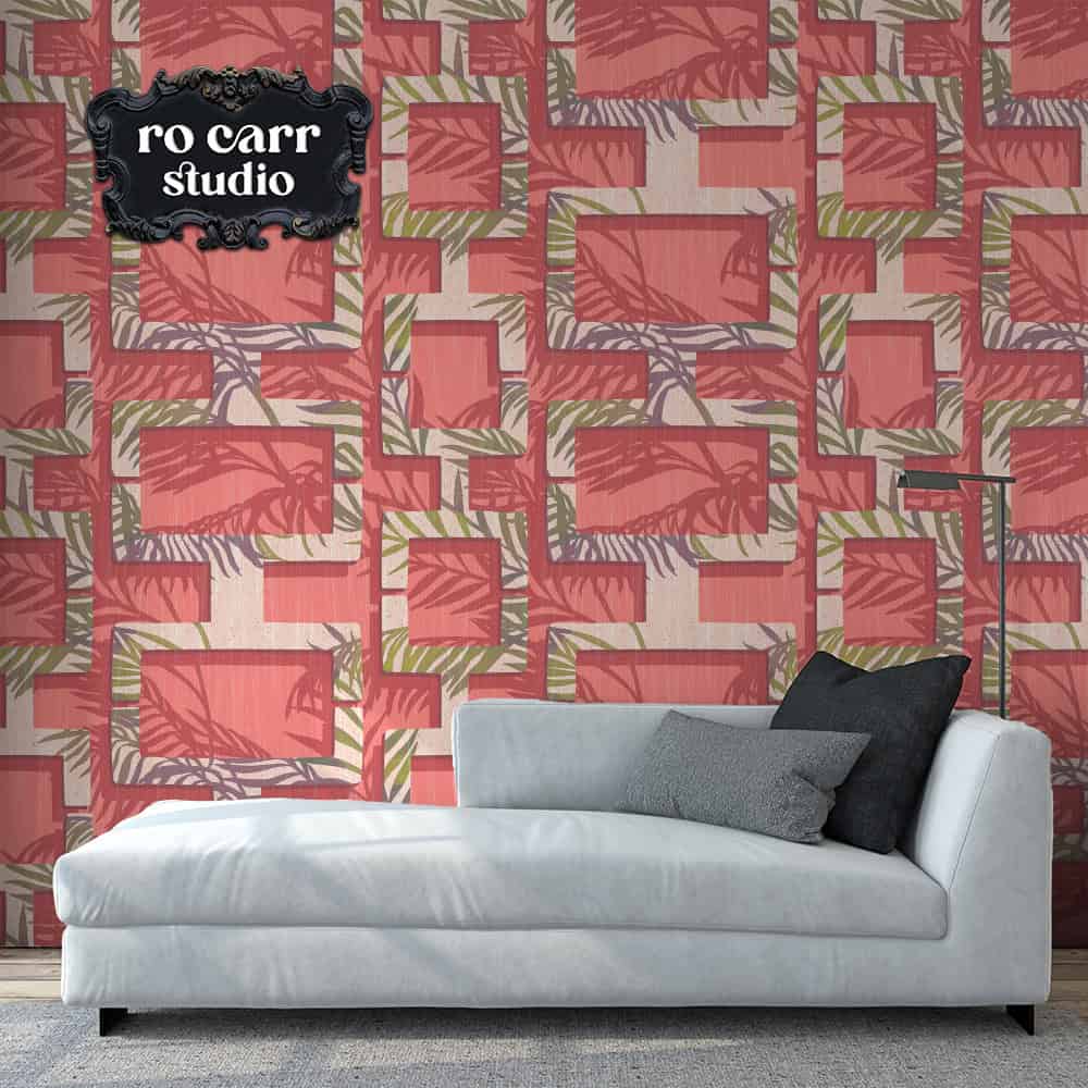 Breeze block design in pink shown as wallpaper in mockup room with chaise lounge.