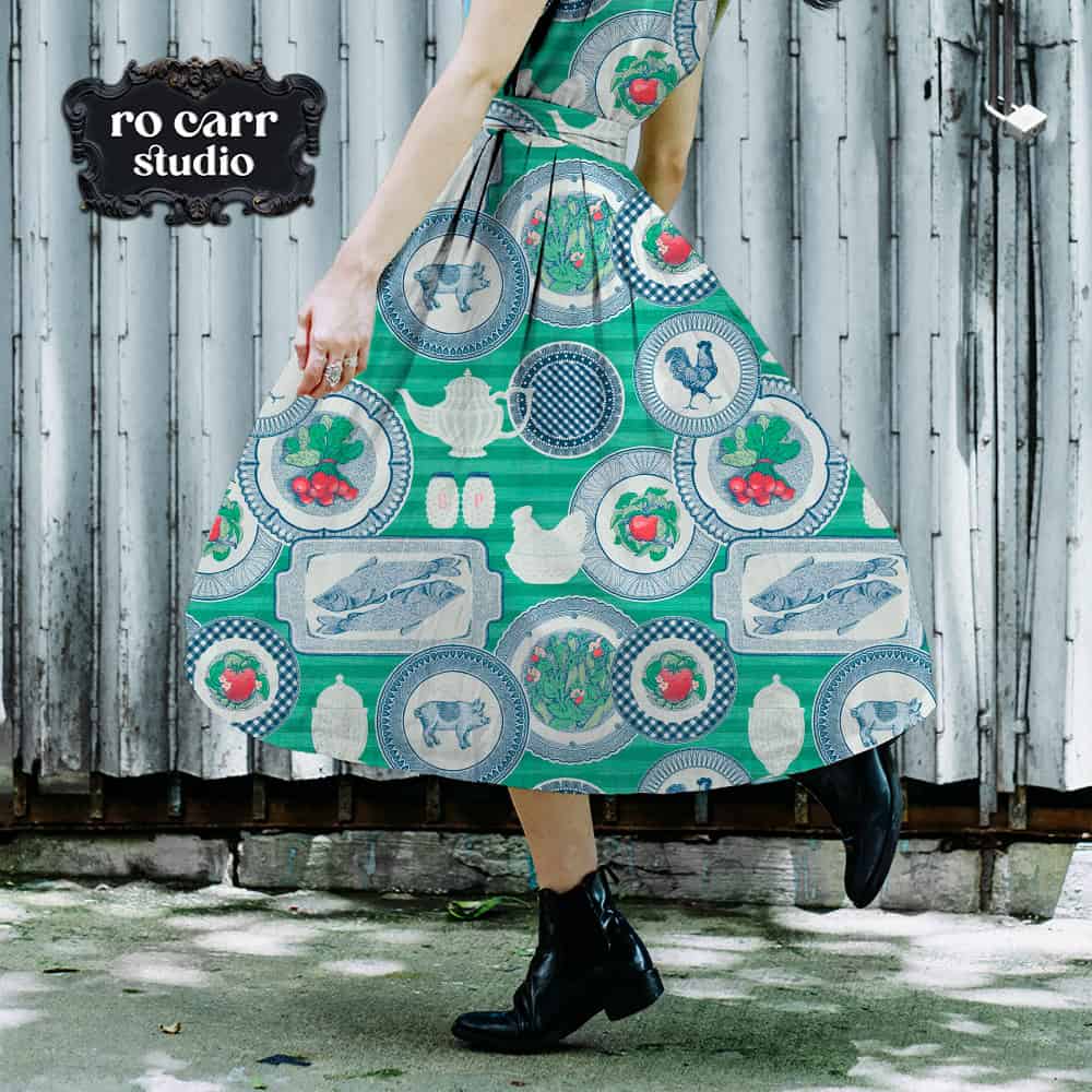 Mockup of woman wearing an a line skirt printed with the featured design.
