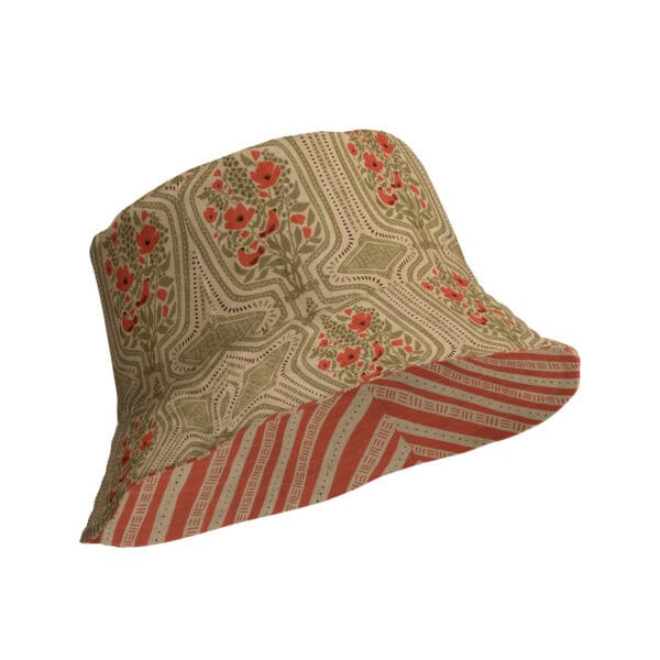 Reversible bucket hat, outside shown with boho terrarium design in tan and red, interior with red and tan tribal marks striped design.