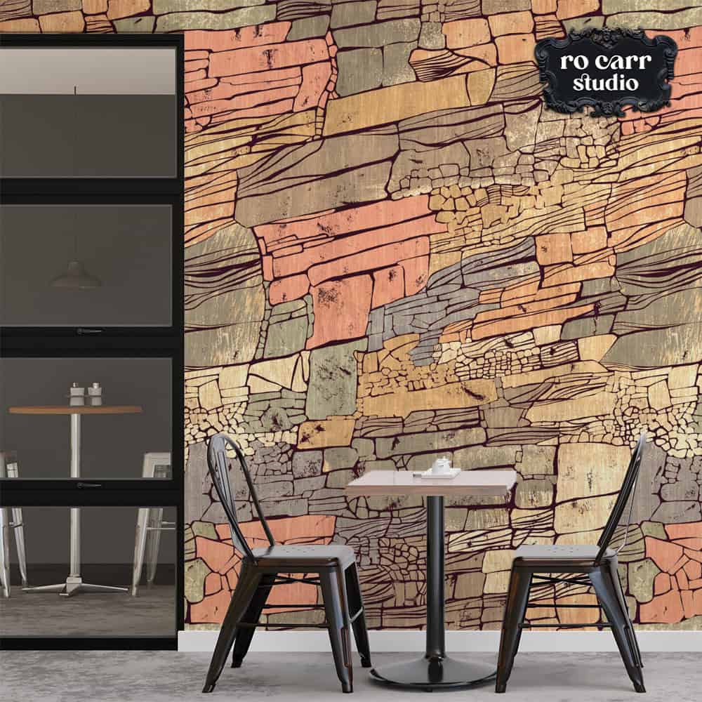 Wallpaper mockup at a cafe with tables and chairs, featuring of with an ottoman and cactus, showing wallpaper with Rock Candy Mountain repeating pattern.