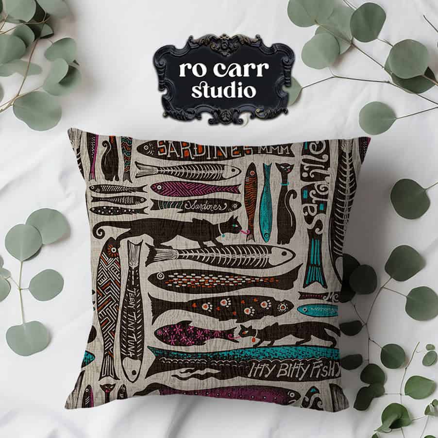 Fabric cushion printed with the Catch of the Day pattern.