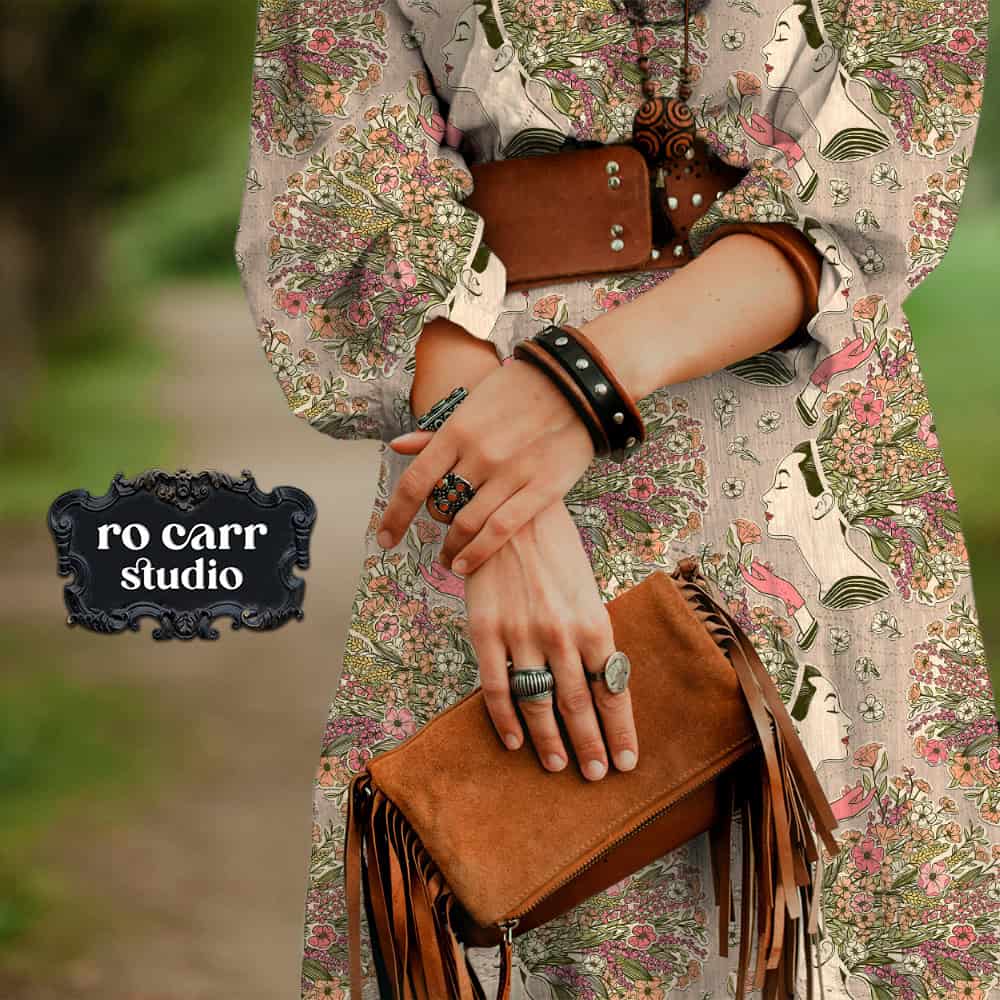 Close-up of hands holding a leather bag with wildflower collage fabric.